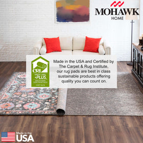 Mohawk Home floor-protection demo on hardwood showing a protected surface.