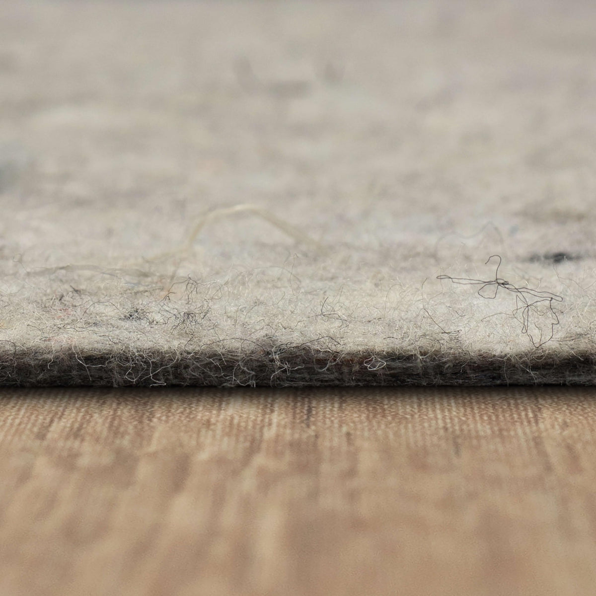 Green Label Plus certified Mohawk Home rug pad for low emissions.