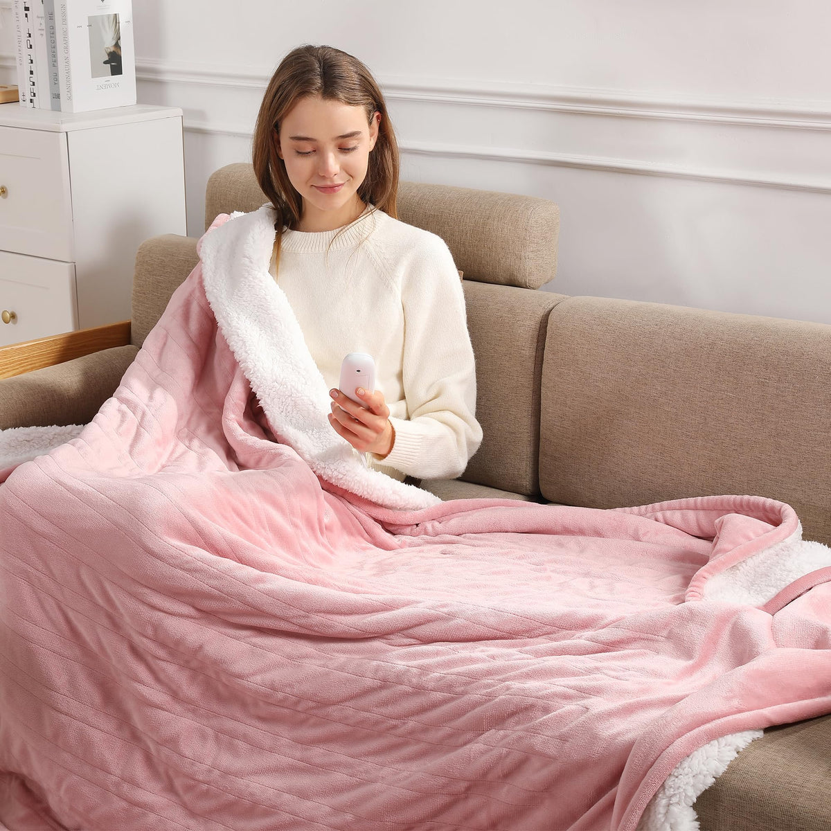 Molatink pink heating blanket folded for compact storage and quick warmth