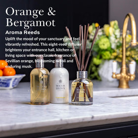 Molton Brown Aroma Reeds diffuser base highlights sleek design and long-lasting aroma.