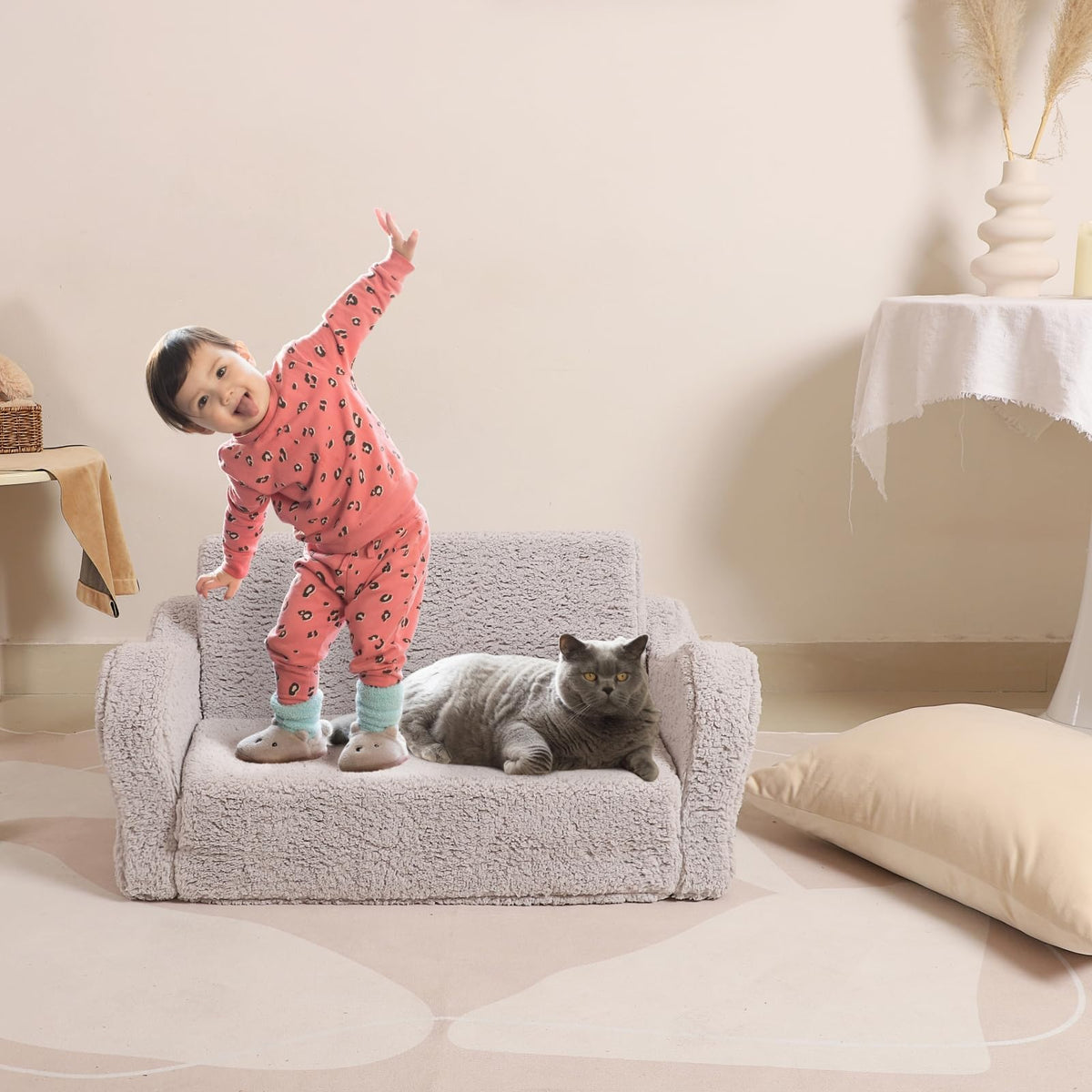 MOMCAYWEX Kids Sofa Sherpa fabric feels soft and cozy for lounging.