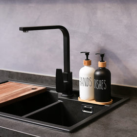 MOMEEMO dish soap dispenser in black and white keeps the kitchen tidy.