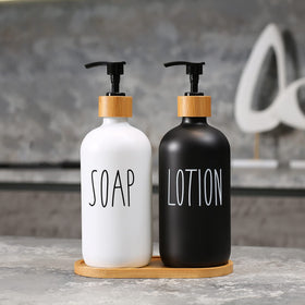 MOMEEMO glass soap dispenser close-up highlighting clear glass and bamboo pump.
