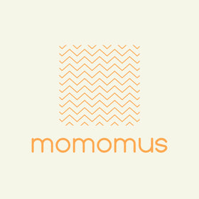 MOMOMUS beach-ready towel sea green doubles as spacious mat.