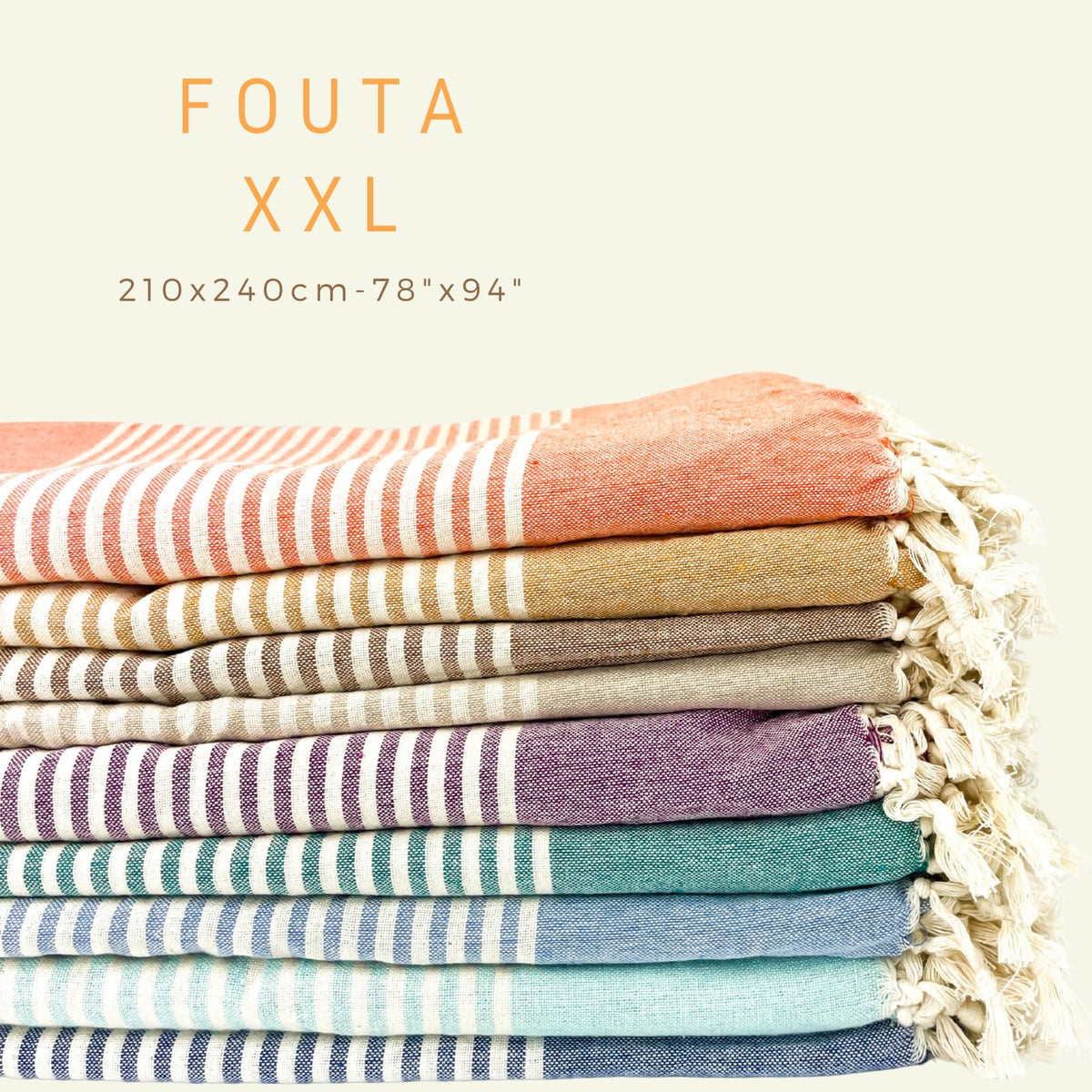 MOMOMUS flatweave Turkish towel sea green with fringes adds artisanal charm.