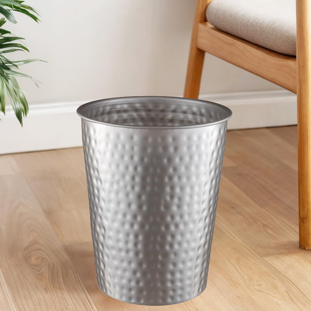 Monarch Abode compact desk trash can fits beside a workstation.