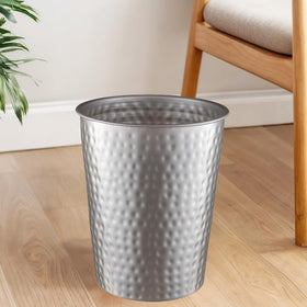 Monarch Abode compact desk trash can fits beside a workstation.