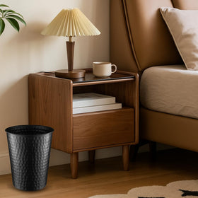 Monarch Abode compact metal trash bin fits beside vanities and desks.