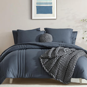 Monbix Queen comforter on bed shows cozy year-round warmth