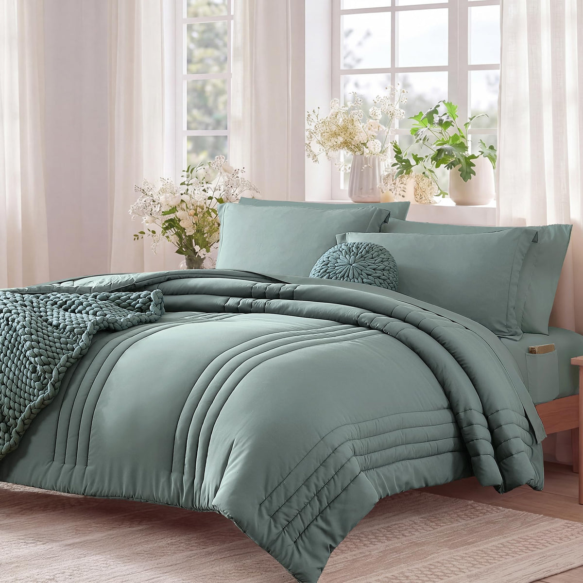 Monbix fabric closeup—soft textile with balanced warmth in sage green.