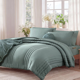 Monbix fabric closeup—soft textile with balanced warmth in sage green.