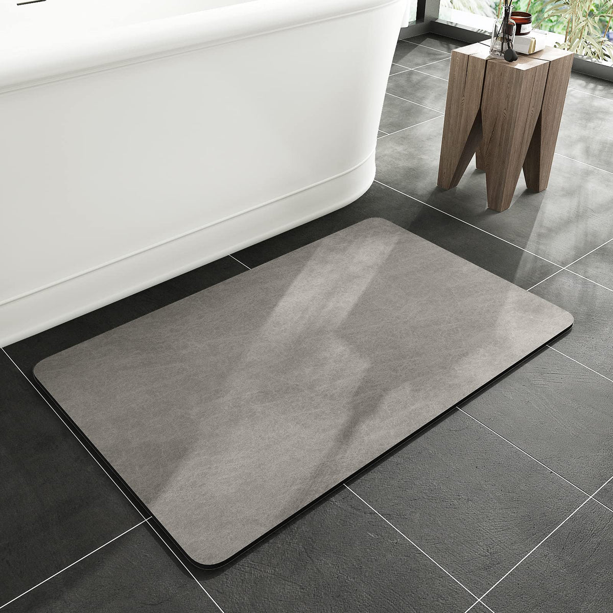 MontVoo bath mat non-slip absorbent keeps bathroom floor dry after showers.