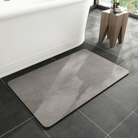 MontVoo bath mat non-slip absorbent keeps bathroom floor dry after showers.