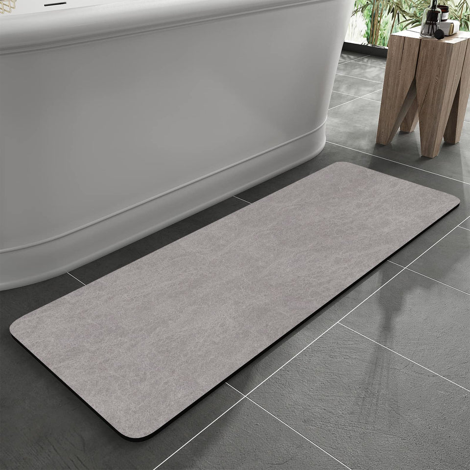 MontVoo bath mat with rubber backing for secure grip on wet floors.