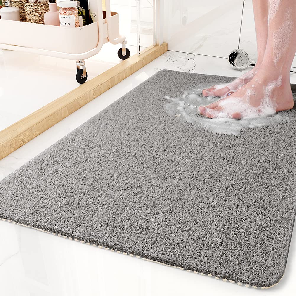 MontVoo non-slip bathtub mat with 24x35 inch size for secure footing.