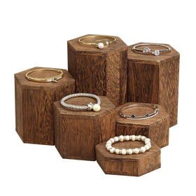 MOOCA wooden hexagon risers with six height levels for versatile display.