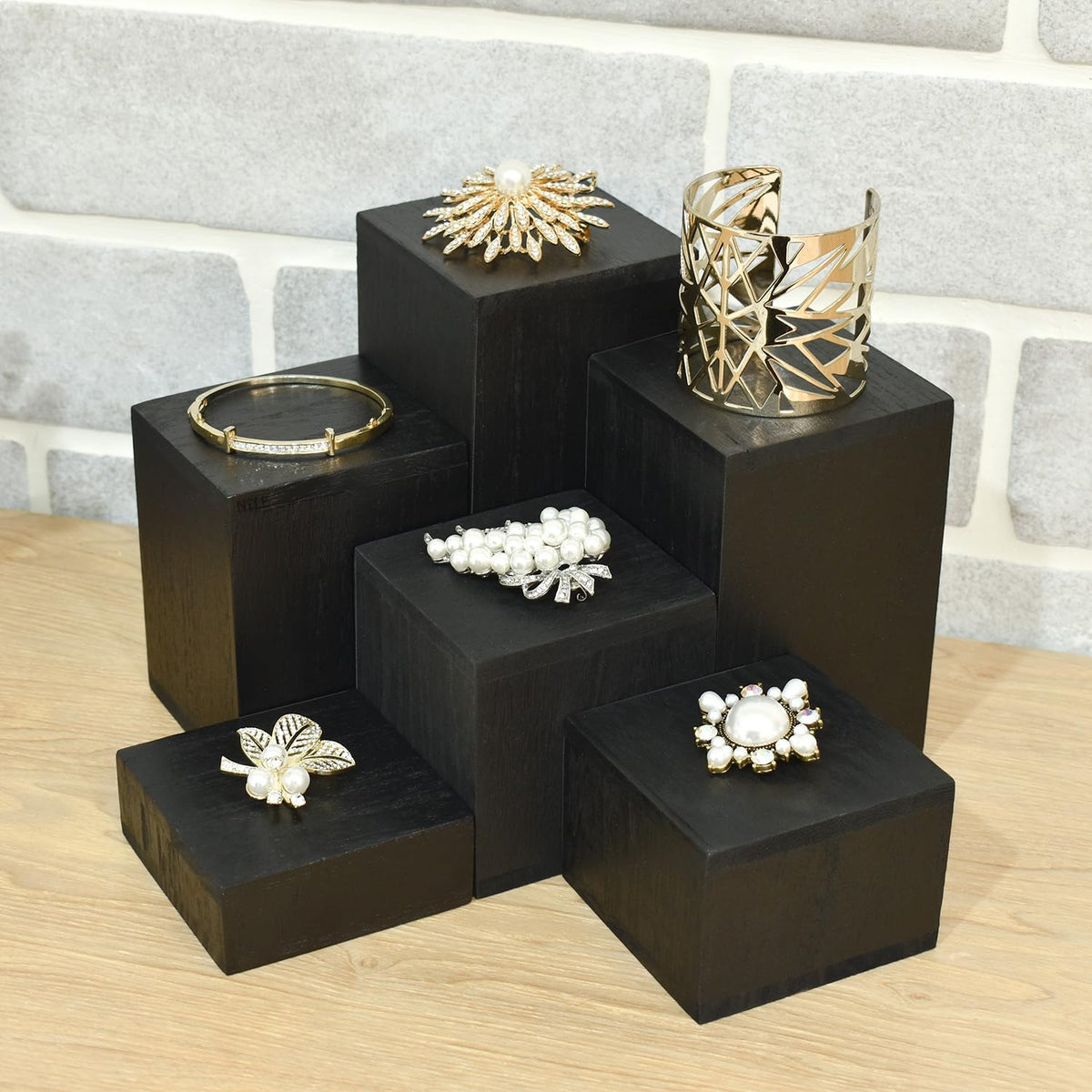 MOOCA compact six-piece risers fit small display spaces.