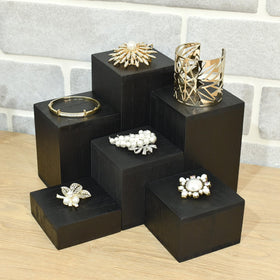 MOOCA compact six-piece risers fit small display spaces.