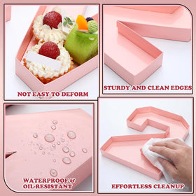 Mooliwe pink display highlights treats like candies and strawberries.