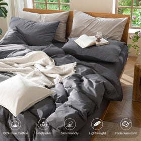 MooMee bedding setup in a dark grey room exuding resort-like calm.