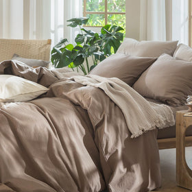 MooMee 100% washed cotton linen-like texture on king bed.