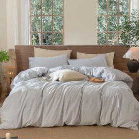 MooMee striped duvet cover in cornflower blue pinstripes for crisp bedroom style and breathability.