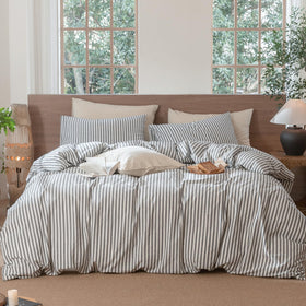 MooMee striped duvet cover in dark grey and white adds a crisp, inviting bed aesthetic