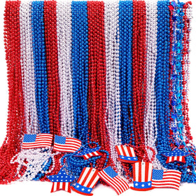 Moon Boat patriotic necklaces with blue, red, and white beads for July 4th celebrations.