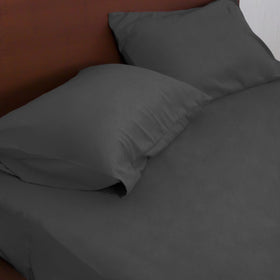 Moonsea black queen sheets on a bed emphasizing the deep-pocket design.