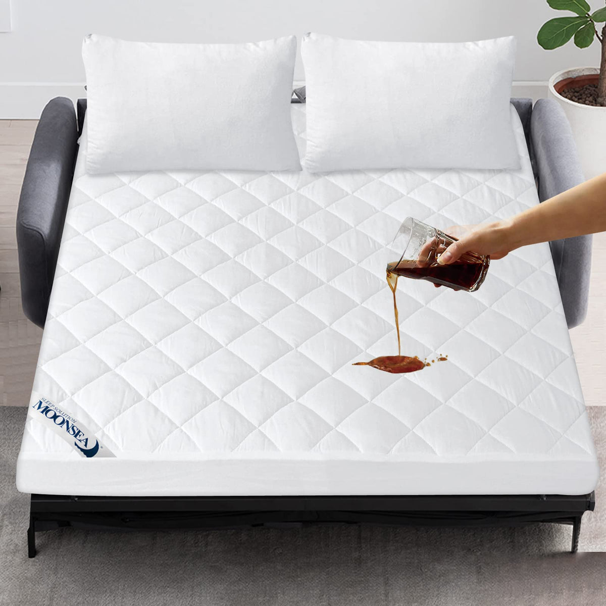 Moonsea waterproof sofa bed mattress pad protects against liquids on a 54x72 mattress.