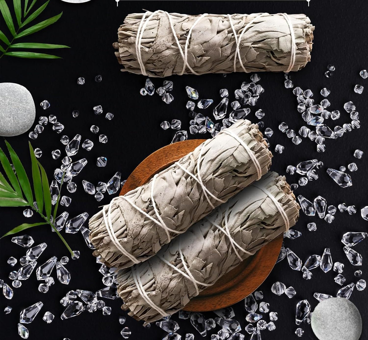 Moonwater Elixirs sage smudge with clear quartz crystals amplifies purification and energy.