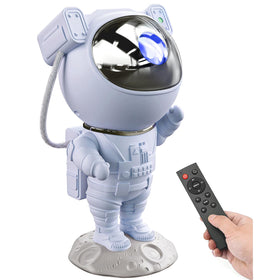 Mooyran astronaut galaxy projector lights up a cozy bedroom with a starry sky.