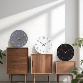 Mosewa minimalist design clock showcasing khaki hands and rose-gold numerals.