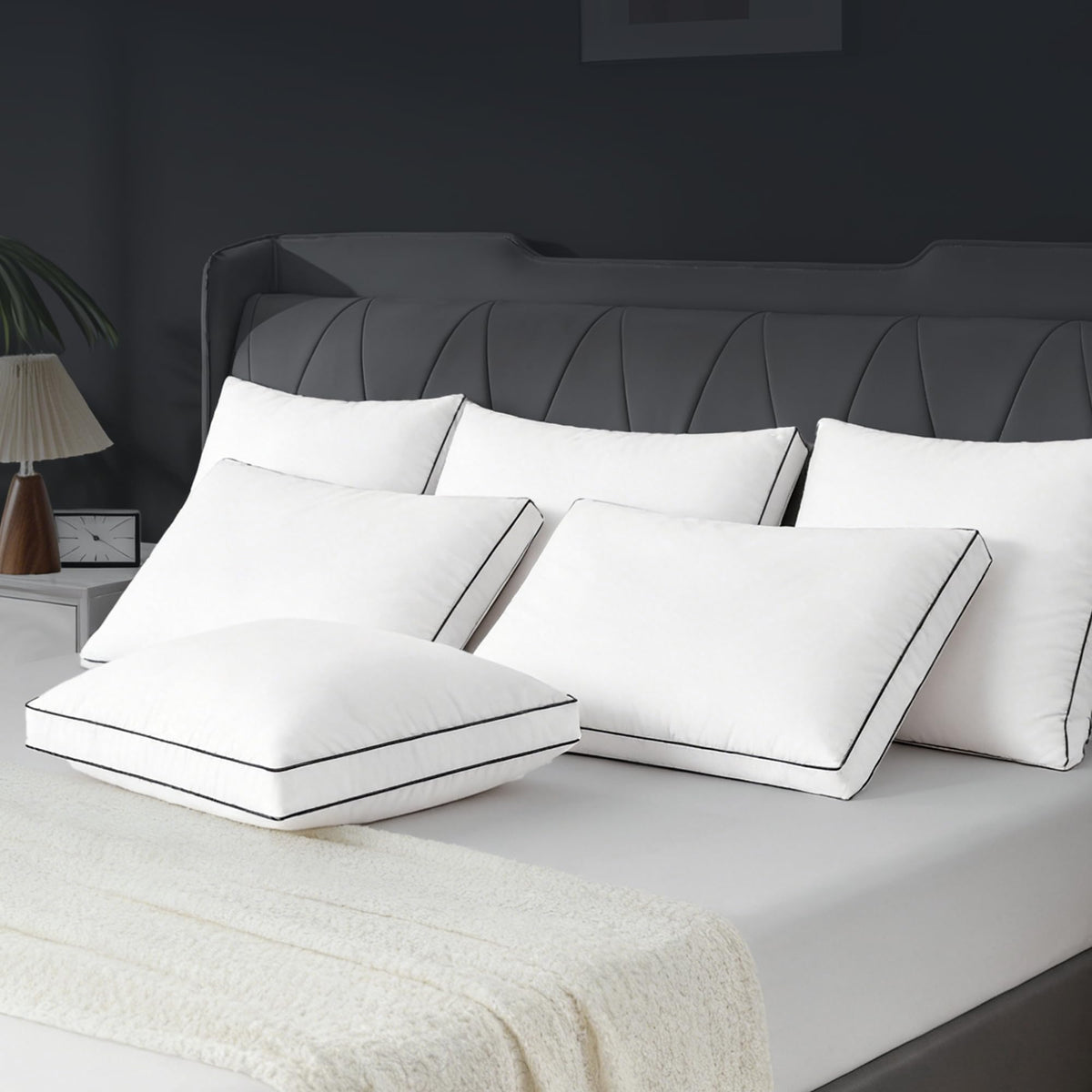 Mosluna easy-care pillow shown ready for machine washing and low tumble dry.