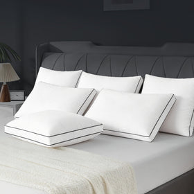 Mosluna easy-care pillow shown ready for machine washing and low tumble dry.