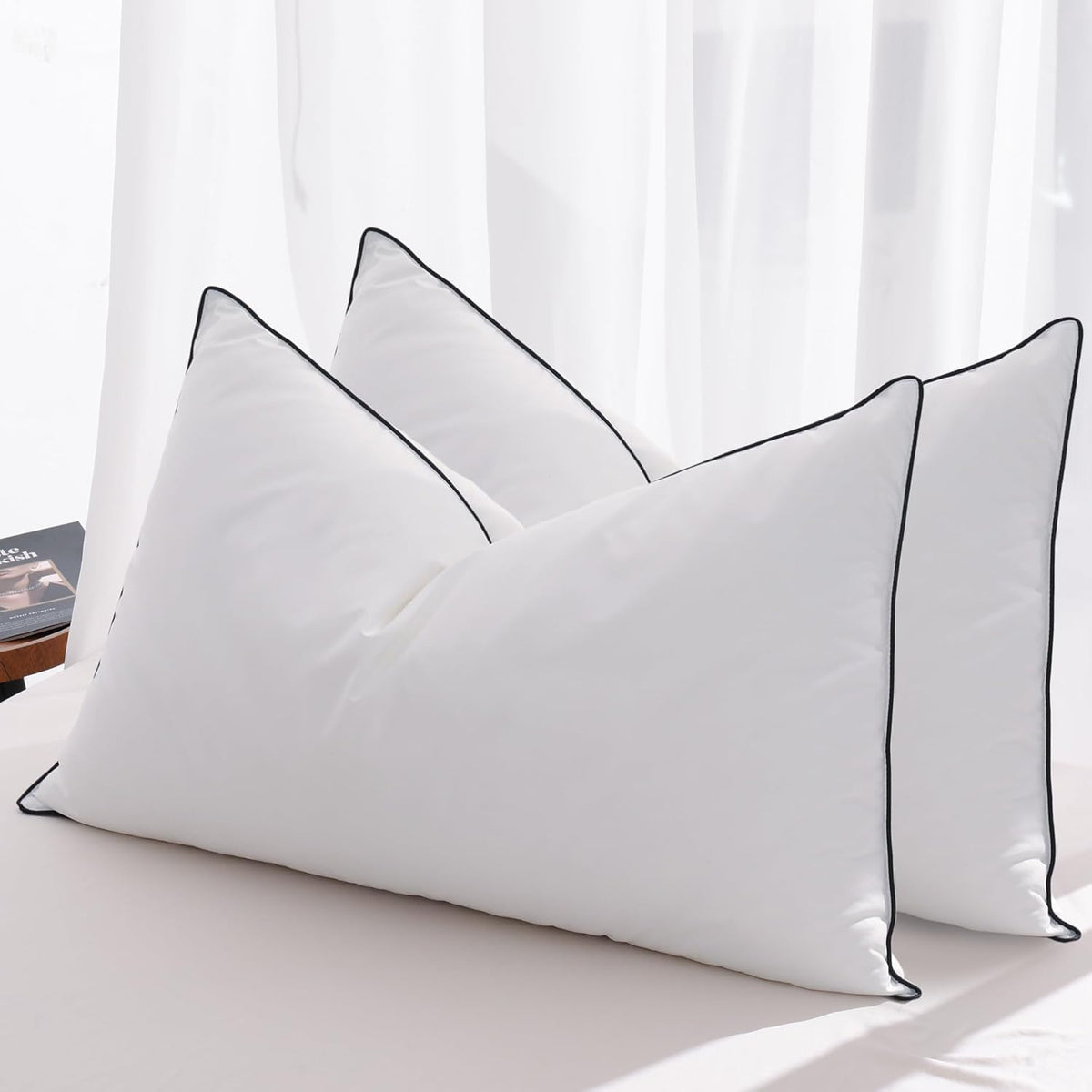 Mosluna Queen 2-pack feather down pillow with Airyfil for neck support.