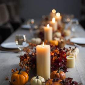 MOSROAD pillar candles used with holders for a polished display.