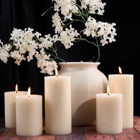 Festive MOSROAD ivory pillar candles suit Christmas and home decor.