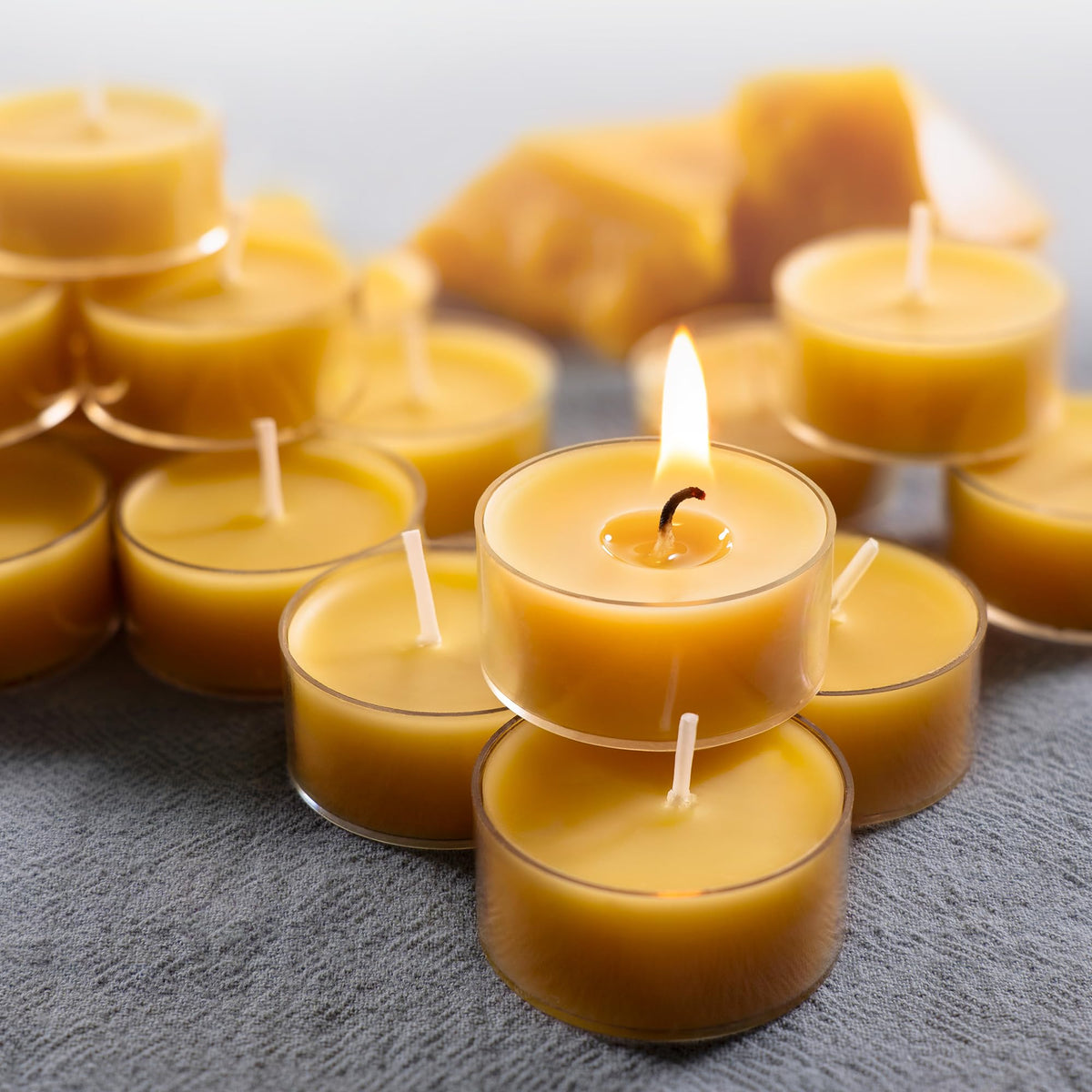 MOSROAD pure beeswax tealight delivers smokeless burn with a gentle honey aroma.