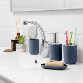 Moss & Stone toilet brush with blue accents for a clean, organized bathroom.