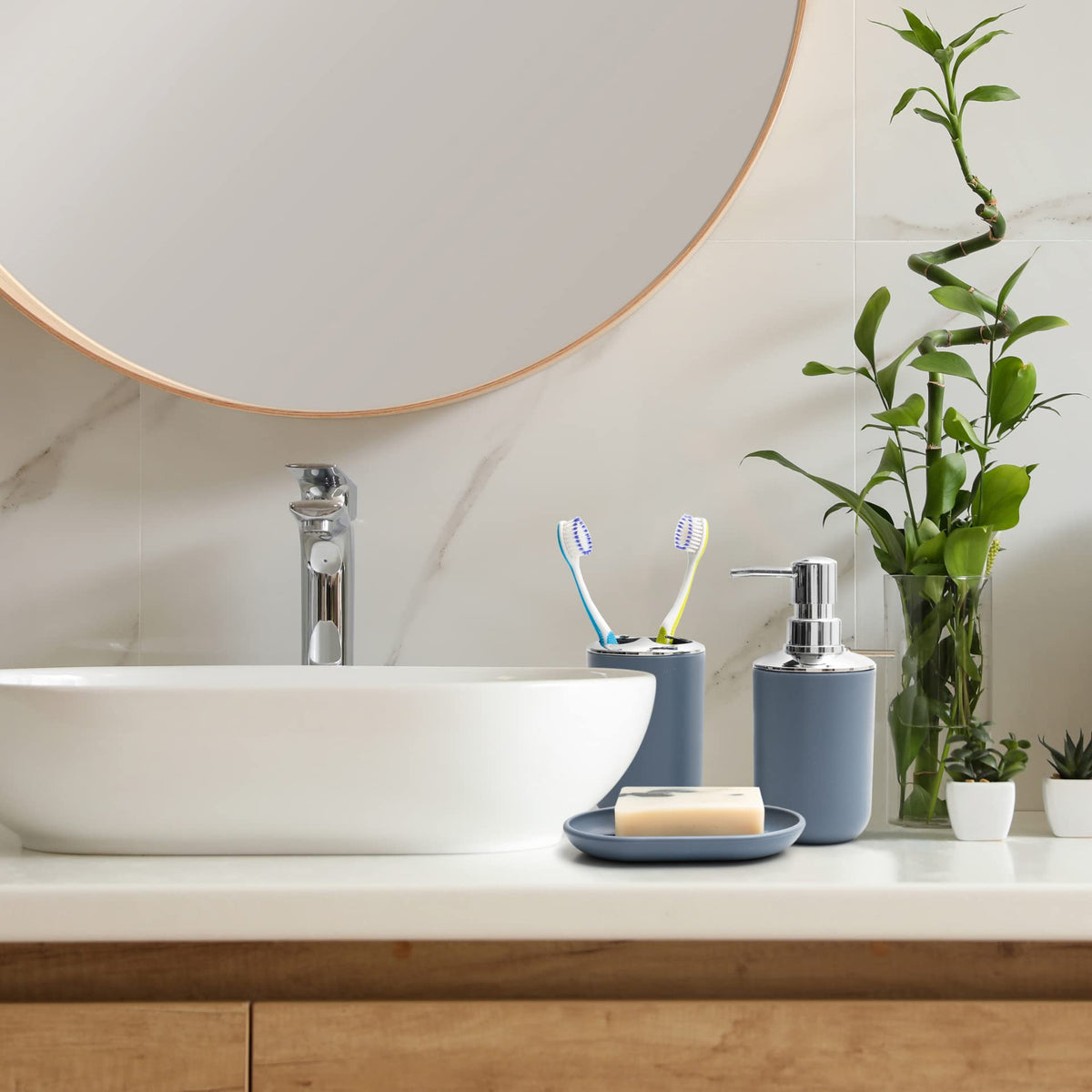 Moss & Stone trash can with blue housing for a neat bath area.