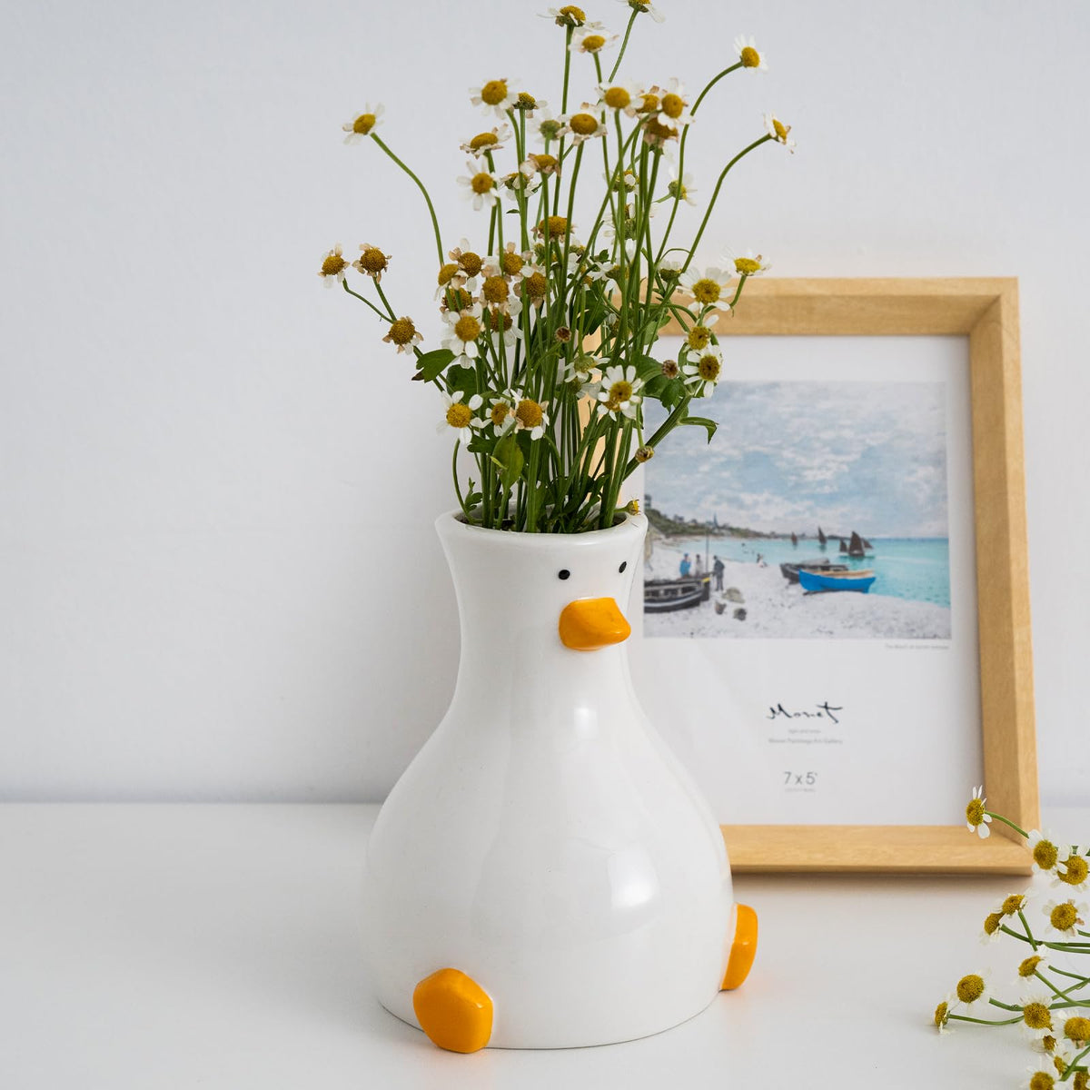 MOUGIGI artisan vase offers unique table decor with whimsical charm.