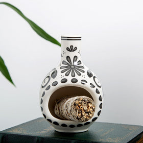 MOUGIGI compact holder doubles as burner for incense and sticks.
