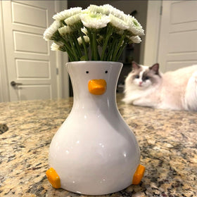 MOUGIGI duck vase in white stoneware, ideal for subtle floral displays.