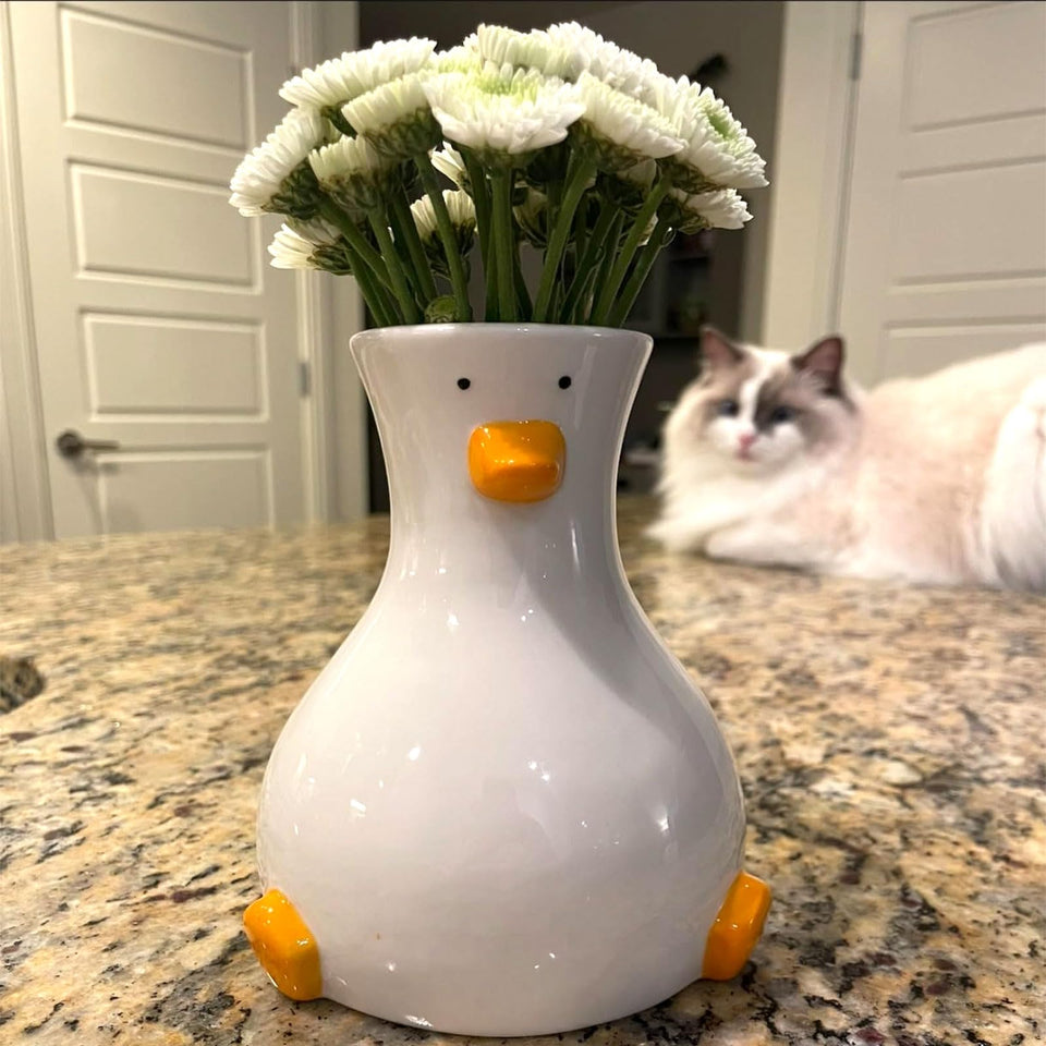 MOUGIGI duck vase in white stoneware, ideal for subtle floral displays.