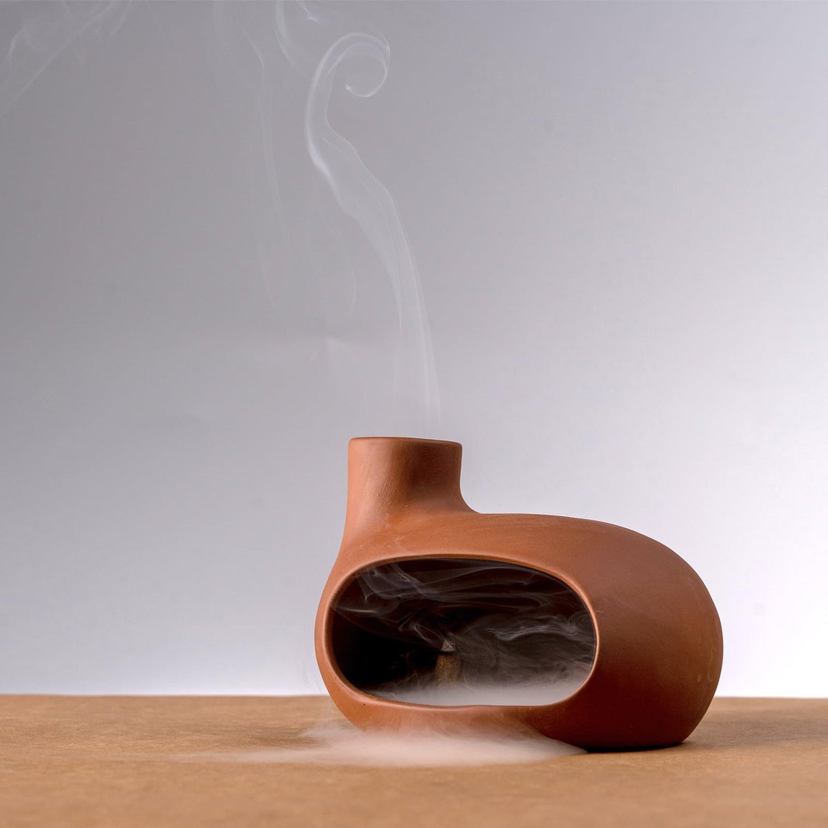 MOUGIGI Terracotta Palo Santo Holder dimensions show 4.7 inch diameter and 3.5 inch height.