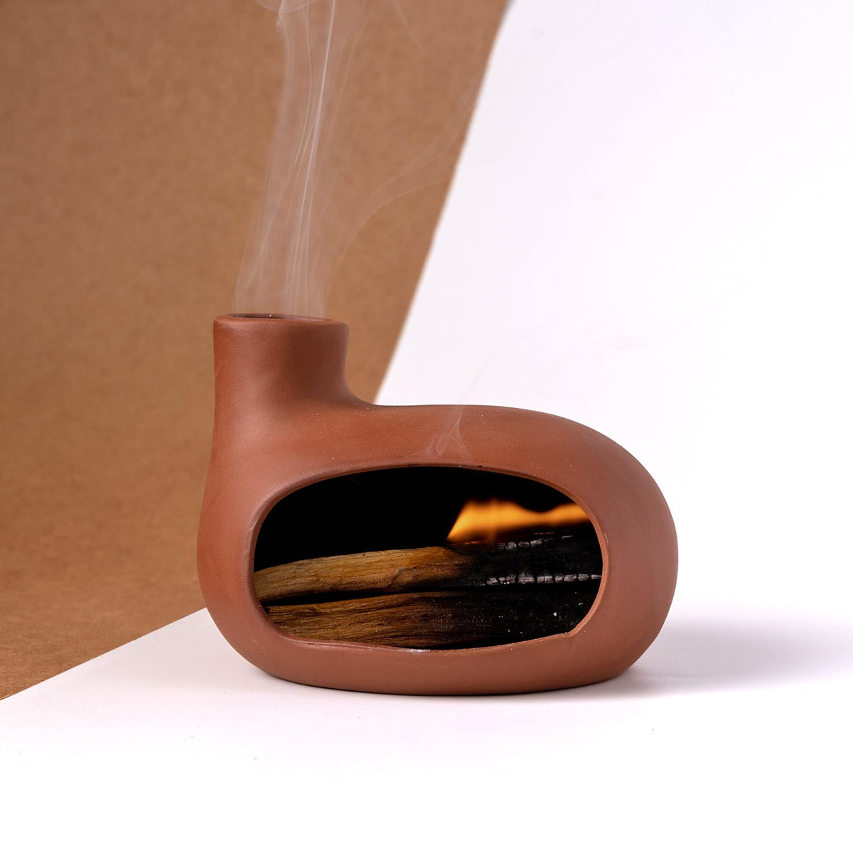 MOUGIGI Terracotta Holder's minimalist design suits yoga studios and cozy meditation corners.