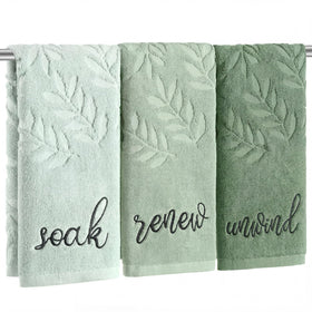 Moukeren sage green hand towels with leaf-pattern for fresh bathroom decor in daily use.