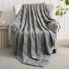 Mr. Sandman weighted blanket in a modern grey bedroom setting