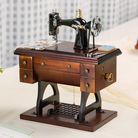 Mr.Winder miniature sewing machine close-up highlights intricate handwork